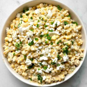Mexican street corn dip in bowl.