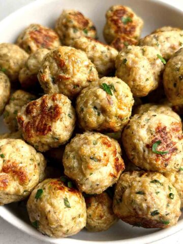 close up of turkey meatballs in bowl.