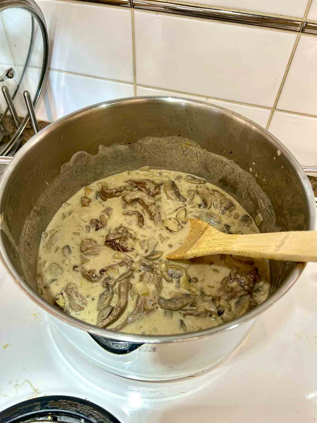 steak added back to stroganoff sauce,