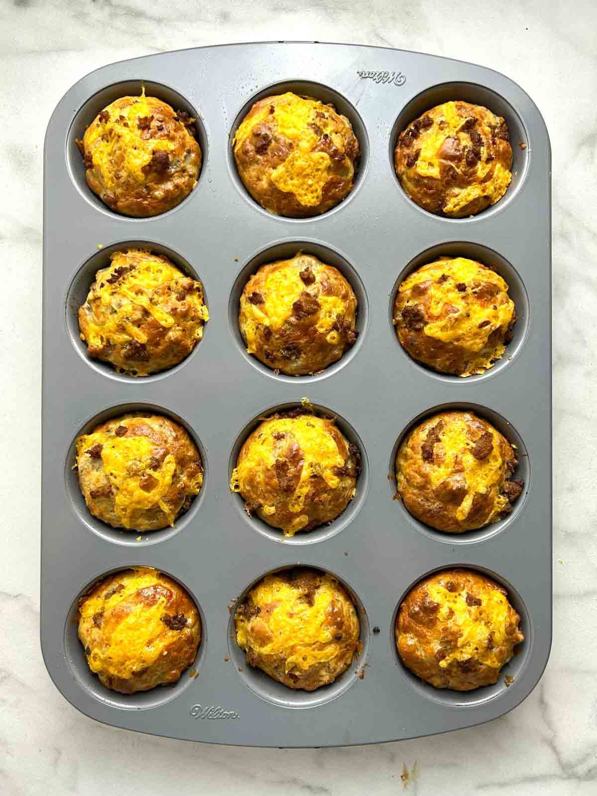 muffins after baking; golden brown on top.