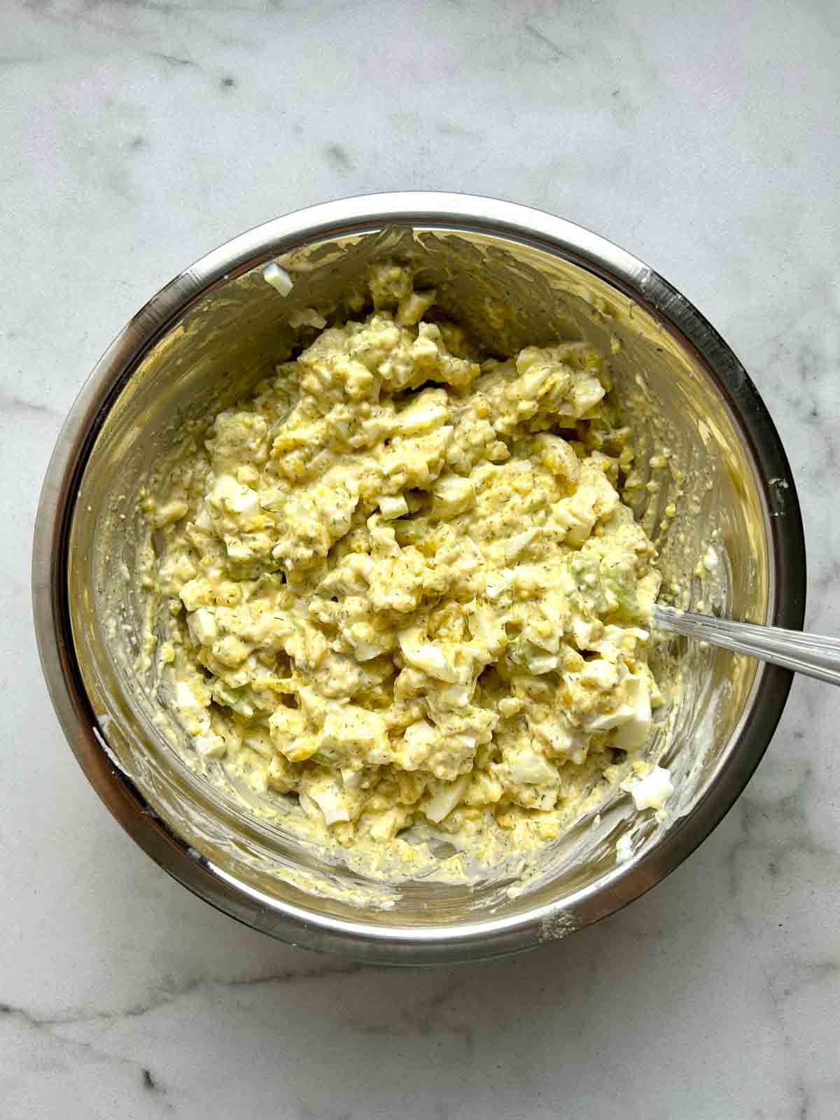 egg whites and celery folded into egg salad.
