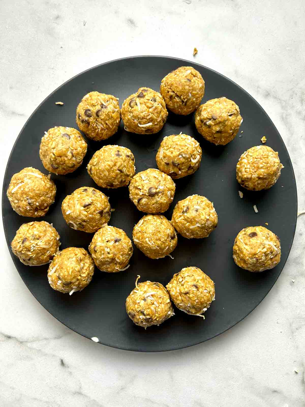 mixture rolled into balls on plate.